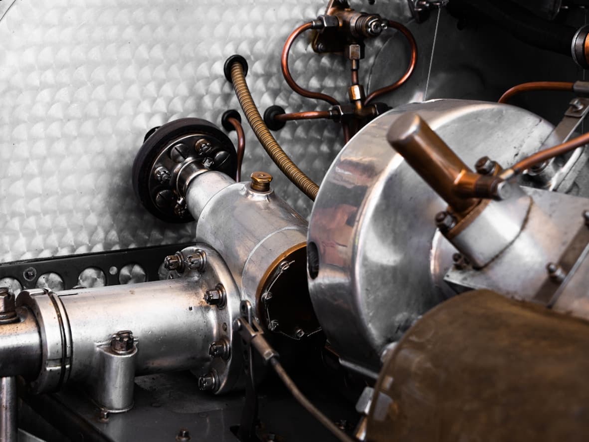 Spark plug inspection and replacement in engine bay